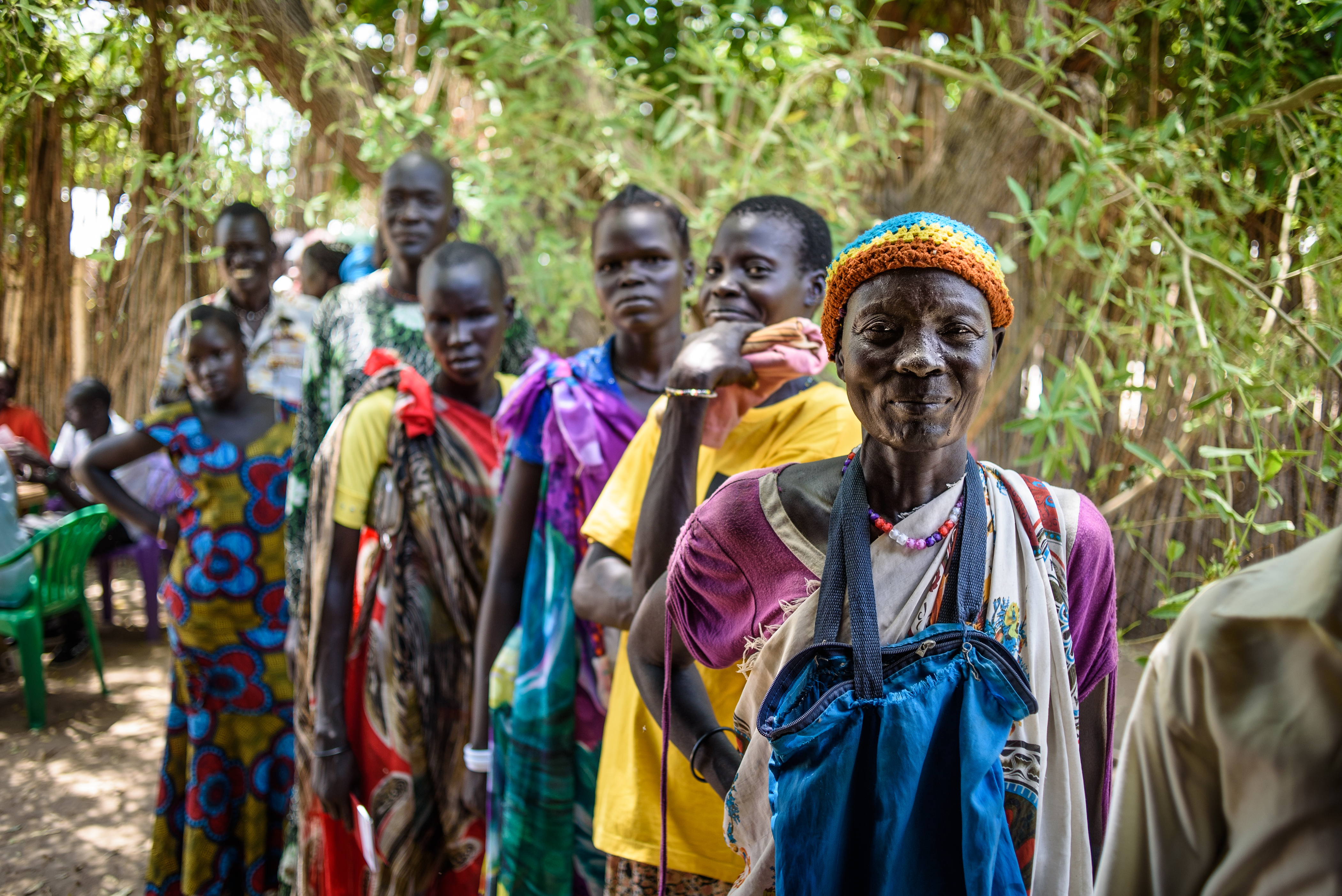 People in South Sudan wait in line for a cash distribution