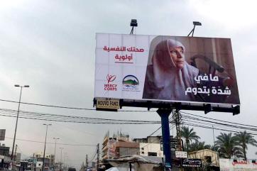 A billboard from a mercy corps lebanon campaign to raise awareness for mental health.