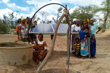 A senegalese entrepreneur purchased a solar-powered pump to irrigate her land. energy 4 impact helped women agricultural co-op members receive financing for equipment.