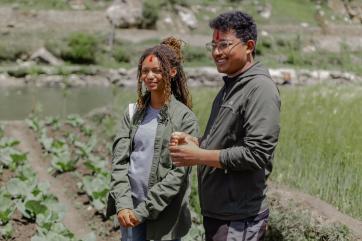 Leah thomas with mercy corps employee in nepal. 