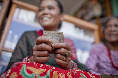 Woman holding cash