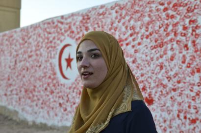 Woman in yellow headscarf in tunisia