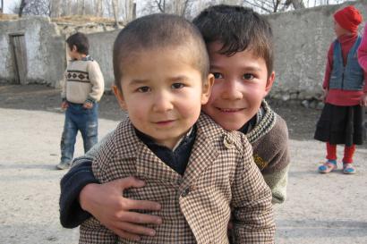 Two children posing for the camera.