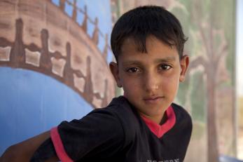 A young boy in a black shirt in jordan