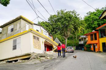 Inspecting damage to home foundations.