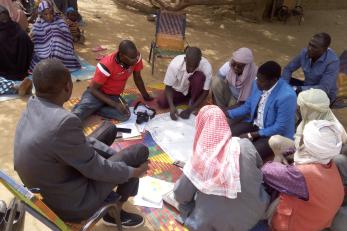 Community members come together to discuss and map out the main sources of conflict and proposed solutions which then inform our programs.