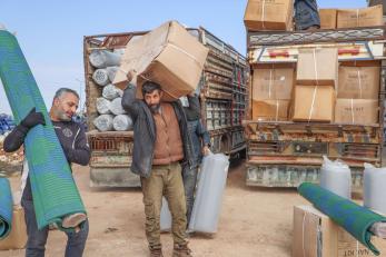 After the 2023 earthquake, mercy corps distributed kits for families at camps for displaced people in northwest syria. the kits included mattresses, blankets, solar lamps, rugs, and more.