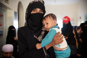 Fawzia, pictured with her son mohammed in 2018, was struggling to find food for her four children. at a mercy corps supported clinic, she found the support she and her family so desperately needed.