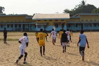 Participants in a running drill in buchanan, liberia. playing sports promotes critical life skills and mental health.