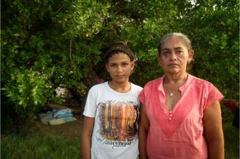 When Oriana (right) and her daughter, Joelbi, fled to Colombia, they found themselves with both less and more than they bargained for: living under a bridge with a large, surrogate family of equally desperate Venezuelan refugees.