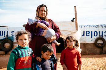 A woman with four young children in Lebanon
