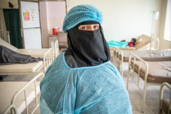 Healthcare worker treats cholera patients at a Mercy Corps-supported clinic in Yemen