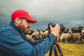 A person taking a photograph.
