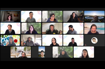 A grid of participant thumbnails during an employee virtual meeting. 