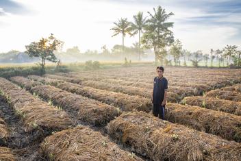 Pak, 42, is a rice farmer in eastern Indonesia, where worsening droughts are putting his livelihood at risk. Mercy Corps is helping him and other farmers learn to grow stronger, heartier crops that can withstand the changing weather.