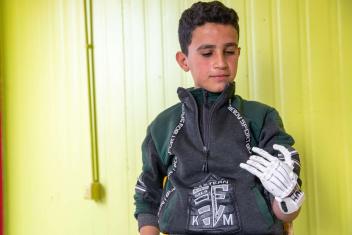 Mohammad, who was born without a fully-developed left hand, tried on his new prosthetic hand. He attended classes in Zaatari camp and our team helped him to strengthen his muscles and learn to use the prosthetic.