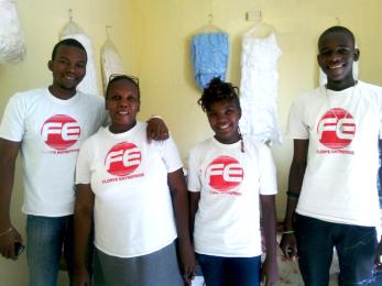 Four people smiling wearing florye entreprise