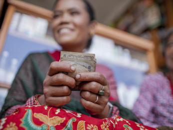 Woman holding cash