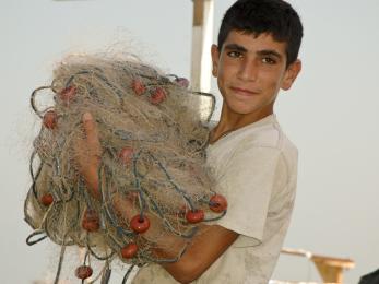 Boy holding a net