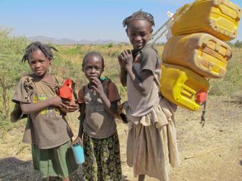 From a young age, girls in ethiopia are expected to gather wood, fetch water and shop for the family’s food. it can take all day to collect enough food and water for one meal, so there is often no time for school. photo: joni kabana for mercy corps