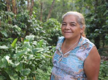 An image of rosario rodriguez, a second-generation coffee producer who helps lead her farmer co-op.