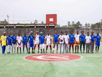 Participants attending an event at a refurbished youth opportunity center, which offers mentoring, supported by Mercy Corps in Buchanan, Liberia..