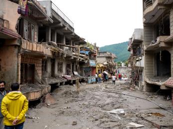 People assess damage in Rasuwa District, Bagmati Province in the wake of the devastating flood in northern Nepal.